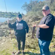 Dad and Lauren Trout Fishing